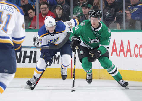 DALLAS, TX – FEBRUARY 21: Jamie Oleksiak #2 of the Dallas Stars tries to keep the puck away against Ivan Barbashev #49 of the St. Louis Blues at the American Airlines Center on February 21, 2019 in Dallas, Texas. (Photo by Glenn James/NHLI via Getty Images)