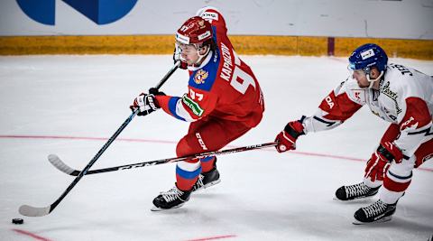 Russian forward Kirill Kaprizov (L) (Photo by ALEXANDER NEMENOV/AFP via Getty Images)