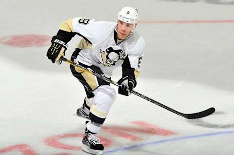 WASHINGTON, DC – NOVEMBER 20: Pascal Dupuis #9 of the Pittsburgh Penguins skates down the ice against the Washington Capitals at the Verizon Center on November 20, 2013 in Washington, DC. (Photo by G Fiume/Getty Images)