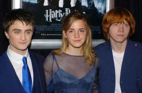 UNITED STATES – NOVEMBER 12: Daniel Radcliffe, Emma Watson and Rupert Grint (l. to r.) get together during the New York premiere of “Harry Potter and the Goblet of Fire” at the Ziegfeld Theatre on W. 54th St. The young actors, who have played, respectively, Harry Potter, Hermione Granger and Ron Weasley in every Harry Potter movie, star together in this fourth installment of the series. (Photo by John Roca/NY Daily News Archive via Getty Images)