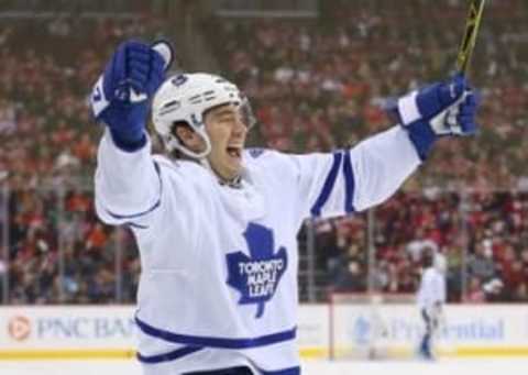 Apr 9, 2016; Newark, NJ, USA; Toronto Maple Leafs right wing P.A. Parenteau (15) celebrates his goal during the first period of their game against the New Jersey Devils at Prudential Center. Mandatory Credit: Ed Mulholland-USA TODAY Sports