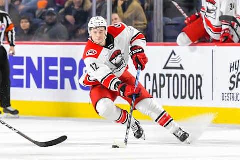 DECEMBER 28: Julien Gauthier #12 of the Charlotte Checkers in control of the puck