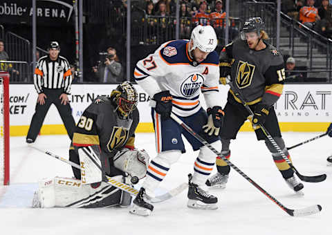 LAS VEGAS, NEVADA – APRIL 01: Malcolm Subban #30 of the Vegas Golden Knights blocks a shot as Milan Lucic #27 of the Edmonton Oilers looks for a rebound in the first period of their game at T-Mobile Arena on April 1, 2019 in Las Vegas, Nevada. (Photo by Ethan Miller/Getty Images)