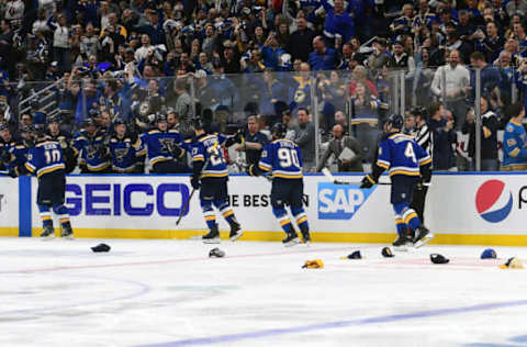 ST. LOUIS, MO – APRIL 20: Blues players are congratulated by their teammates as hats rain down from spectators in celebration of St. Louis Blues leftwing Jaden Schwartz‘s (17) hat trick goal during a first round Stanley Cup Playoffs game between the Winnipeg Jets and the St. Louis Blues, on April 20, 2019, at Enterprise Center, St. Louis, Mo. (Photo by Keith Gillett/Icon Sportswire via Getty Images)