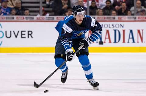 VANCOUVER, BC – JANUARY 5: Oskari Laaksonen #2 of Finland skates with the puck in Gold Medal hockey action of the 2019 IIHF World Junior Championship against the United States on January, 5, 2019 at Rogers Arena in Vancouver, British Columbia, Canada. (Photo by Rich Lam/Getty Images)