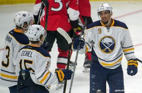 Oct 7, 2016; Ottawa, Ontario, CAN; Buffalo Sabres left wing Evander Kane (9) celebrates with team his goal scored against the Ottawa Senators in the third period at the Canadian Tire Centre. The Sabres defeated the Senators 4-2. Mandatory Credit: Marc DesRosiers-USA TODAY Sports