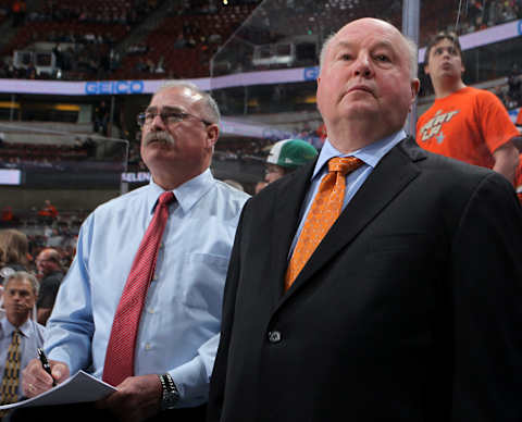 ANAHEIM, CA – FEBRUARY 28: Anaheim Ducks head coach Bruce Boudreau (right) and assistant coach Paul MacLean look on during pregame warmups before the game against the Los Angeles Kings on February 28, 2016 at Honda Center in Anaheim, California. (Photo by Debora Robinson/NHLI via Getty Images)