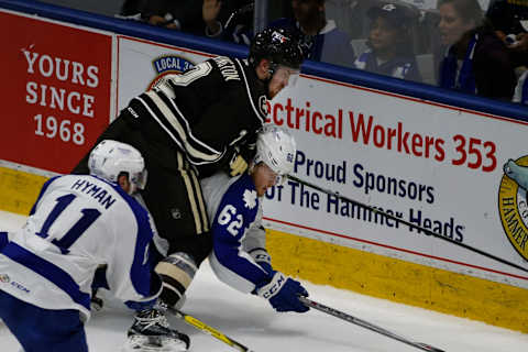 TORONTO, ON – MAY 25 – Marlies’ William Nylander gets a pounding by Hershey’s Tyler Lewington during 2nd period action between Toronto Marlies and Hershey Bears in game three of seven in the Calder Cup Eastern Conference Final in the American Hockey League. May 25, 2016. (Bernard Weil/Toronto Star via Getty Images)