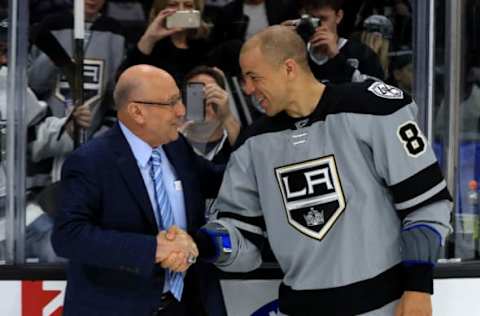 LOS ANGELES, CA – APRIL 08: Los Angeles Kings broadcaster Bob Miller shakes hands with Jarome Iginla