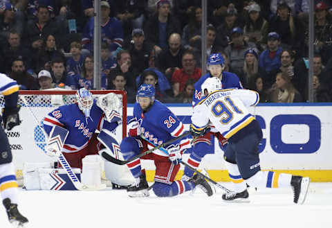 NEW YORK, NEW YORK – MARCH 29: Alexandar Georgiev #40 and Boo Nieves #24 of the New York Rangers defend against Vladimir Tarasenko #91 of the St. Louis Blues at Madison Square Garden on March 29, 2019 in New York City. The Rangers defeated the Blues 4-2. (Photo by Bruce Bennett/Getty Images)