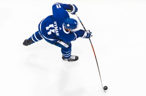 TORONTO, ON – OCTOBER 29: Zach Hyman #11 of the Toronto Maple Leafs shoots during warm up before playing the Calgary Flames period at the Scotiabank Arena on October 29, 2018 in Toronto, Ontario, Canada. (Photo by Mark Blinch/NHLI via Getty Images)