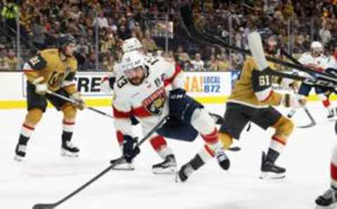 LAS VEGAS, NEVADA – JUNE 13: Sam Reinhart #13 of the Florida Panthers is tripped up by Mark Stone #61 of the Vegas Golden Knights in Game Five of the 2023 NHL Stanley Cup Final at T-Mobile Arena on June 13, 2023 in Las Vegas, Nevada. (Photo by Bruce Bennett/Getty Images)