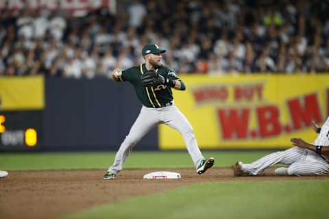 NEW YORK, NY – OCTOBER 3: Jed Lowwrie #8 of the Oakland Athletics turns two during the game against the New York Yankees in the American League Wild Card Game at Yankee Stadium on October 3, 2018 New York, New York. The Yankees defeated the Athletics 7-2. Zagaris/Oakland Athletics/Getty Images)