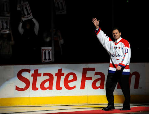 Former Washington Capitals star and Hall of Fame member Mike Gartner waves to fans during a ceremony to retire his Capitals uniform, No. 11, before the Capitals game against the Toronto Maple Leafs at the Verizon Center in Washington, D.C., Sunday, December 28, 2008. (Photo by Chuck Myers/MCT/MCT via Getty Images)