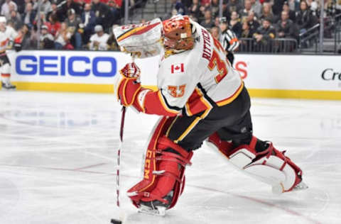 LAS VEGAS, NV – FEBRUARY 21: David Rittich #33 of the Calgary Flames passes the puck against the Vegas Golden Knights during the game at T-Mobile Arena on February 21, 2018 in Las Vegas, Nevada. It is difficult to have faith in Rittich after his second half performance.  (Photo by David Becker/NHLI via Getty Images)