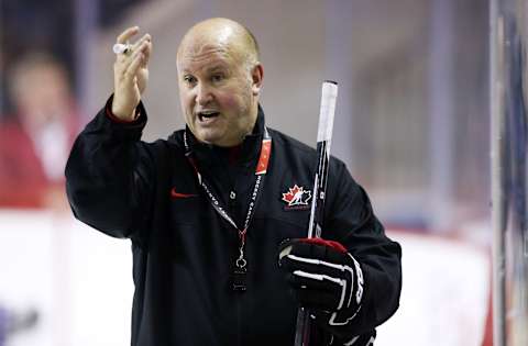 ST CATHARINES, ON – DECEMBER 15: Head Coach Benoit Groulx talks to the players during the Canada National Junior Team practice at the Meridian Centre on December 15, 2014 in St Catharines, Ontario, Canada. (Photo by Vaughn Ridley/Getty Images)