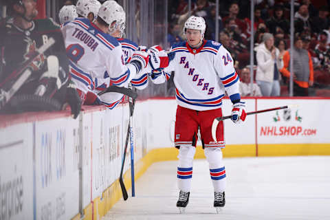 GLENDALE, ARIZONA – DECEMBER 15: Kaapo Kakko #24 of the New York Rangers celebrates with teammates on the bench after scoring a goal against the Arizona Coyotes during the second period of the NHL game at Gila River Arena on December 15, 2021, in Glendale, Arizona. (Photo by Christian Petersen/Getty Images)