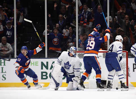 Mathew Barzal #13 and Brock Nelson #29 of the New York Islanders celebrate a power-play goal. (Photo by Bruce Bennett/Getty Images)