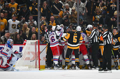 PITTSBURGH, PENNSYLVANIA – NOVEMBER 22: The Pittsburgh Penguins and New York Rangers engage in a post-whistle scrum in the second period during the game at PPG PAINTS Arena on November 22, 2023 in Pittsburgh, Pennsylvania. (Photo by Justin Berl/Getty Images)