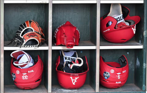 OMAHA, NE – JUNE 26: A general view of the Arkansas Razorbacks batting helmet case in the dugout, prior to game one of the College World Series Championship Series between the Arkansas Razorbacks and the Oregon State Beavers on June 26, 2018 at TD Ameritrade Park in Omaha, Nebraska. (Photo by Peter Aiken/Getty Images)