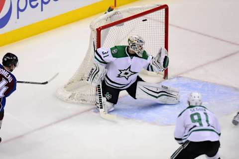 Feb 4, 2016; Denver, CO, USA; Dallas Stars goalie Antti Niemi (31) is scored on by Colorado Avalanche goalie Calvin Pickard (31) in the first half at the Pepsi Center. Mandatory Credit: Ron Chenoy-USA TODAY Sports