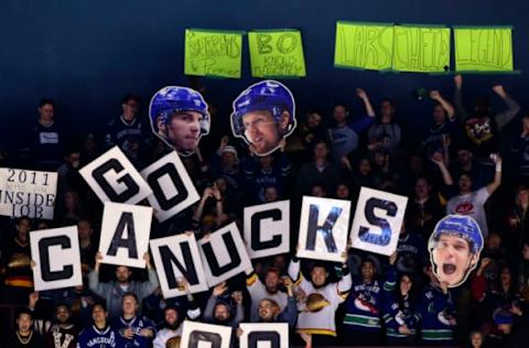 Dec 20, 2016; Vancouver, British Columbia, CAN; Vancouver Canucks fans celebrate a goal against the Winnipeg Jets during the third period at Rogers Arena. The Vancouver Canucks won 4-1. Mandatory Credit: Anne-Marie Sorvin-USA TODAY Sports