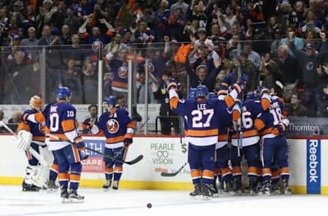 NHL Power Rankings: New York Islanders celebrate the game winning goal by right wing Josh Bailey (12) in overtime against the Anaheim Ducks at Barclays Center. New York Islanders won 3-2 in overtime. Mandatory Credit: Anthony Gruppuso-USA TODAY Sports