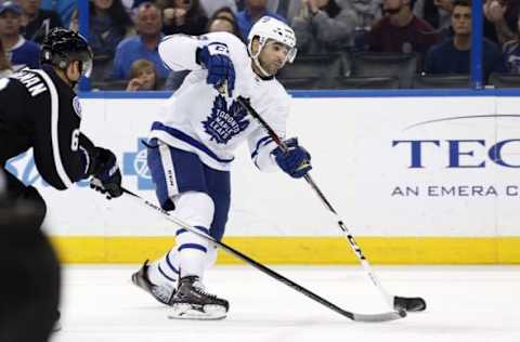 Dec 29, 2016; Tampa, FL, USA; Toronto Maple Leafs center Nazem Kadri (43) shoots as Tampa Bay Lightning defenseman Anton Stralman (6) attempted to defend during the third period at Amalie Arena. Mandatory Credit: Kim Klement-USA TODAY Sports