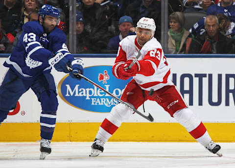 TORONTO, ON – DECEMBER 23: Trevor Daley #83 of the Detroit Red Wings skating in his 1000th NHL game against Nazem Kadri #43 of the Toronto Maple Leafs. (Photo by Claus Andersen/Getty Images)