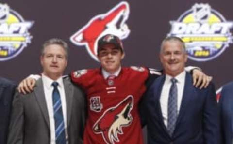 Jun 24, 2016; Buffalo, NY, USA; Clayton Keller poses for a photo after being selected as the number seven overall draft pick by the Arizona Coyotes in the first round of the 2016 NHL Draft at the First Niagra Center. Mandatory Credit: Timothy T. Ludwig-USA TODAY Sports