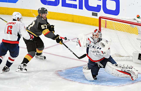 Braden Holtby of the Washington Capitals blocks a shot by Deryk Engelland of the Vegas Golden Knights as Michal Kempny of the Capitals defends against David Perron of the Golden Knights in the second period of Game Two of the 2018 NHL Stanley Cup Final at T-Mobile Arena on May 30, 2018.