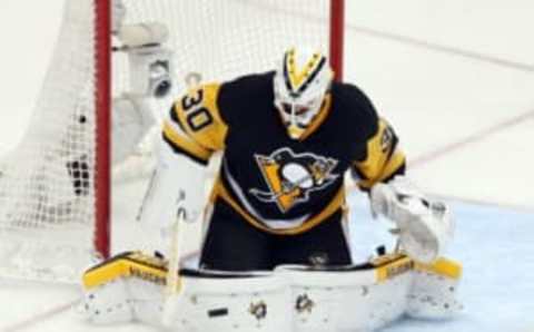 May 10, 2016; Pittsburgh, PA, USA; Pittsburgh Penguins goalie Matt Murray (30) makes a save against the Washington Capitals in overtime in game six of the second round of the 2016 Stanley Cup Playoffs at the CONSOL Energy Center. The Pens won 4-3 in overtime to win the series 4 games to 2. Mandatory Credit: Charles LeClaire-USA TODAY Sports