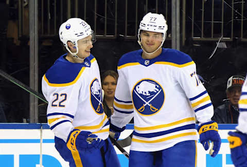 NEW YORK, NEW YORK – APRIL 10: JJ Peterka #77 of the Buffalo Sabres (R) celebrates his first period goal against the New York Rangers and is joined by Jack Quinn #22 (L) at Madison Square Garden on April 10, 2023 in New York City. (Photo by Bruce Bennett/Getty Images)