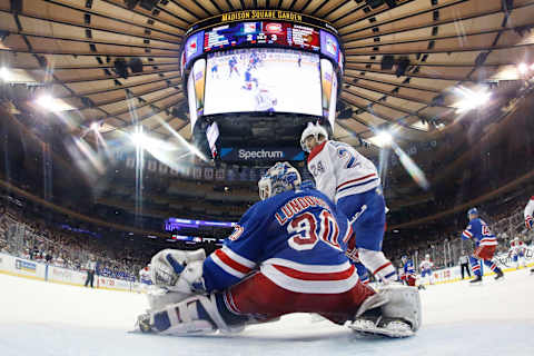 NEW YORK, NY – NOVEMBER 06: Henrik Lundqvist #30 of the New York Rangers tends the net against Phillip Danault #24 of the Montreal Canadiens at Madison Square Garden on November 6, 2018 in New York City. The New York Rangers won 5-3. (Photo by Jared Silber/NHLI via Getty Images)