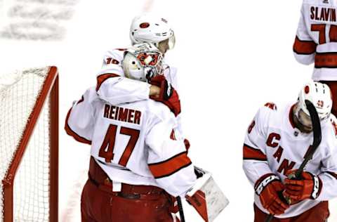 James Reimer #47 and Dougie Hamilton #19 (Photo by Elsa/Getty Images)