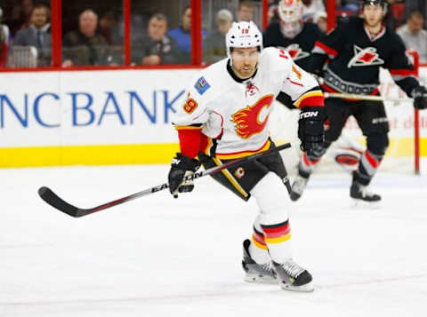 Jan 24, 2016; Raleigh, NC, USA; Calgary Flames forward David Jones (19) watches the play against the Carolina Hurricanes at PNC Arena. The Carolina Hurricanes defeated the Calgary Flames 5-2. Mandatory Credit: James Guillory-USA TODAY Sports