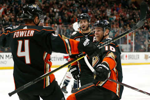 ANAHEIM, CALIFORNIA – FEBRUARY 17: Cam Fowler #4 of the Anaheim Ducks, Corey Perry #10 of the Anaheim Ducks and Adam Henrique #14 of the Anaheim Ducks celebrate a goal against the Washington Capitals during the third period at Honda Center on February 17, 2019, in Anaheim, California. (Photo by Katharine Lotze/Getty Images)