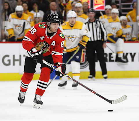 CHICAGO, ILLINOIS – JANUARY 09: Patrick Kane #88 of the Chicago Blackhawks passes against the Nashville Predators at the United Center on January 09, 2019 in Chicago, Illinois. The Predators defeated the Blackhawks 4-3 in overtime. (Photo by Jonathan Daniel/Getty Images)