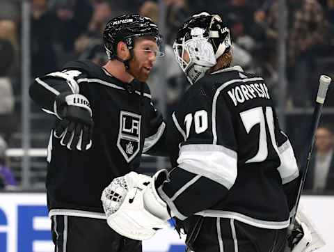 LOS ANGELES, CALIFORNIA – MARCH 04: Vladislav Gavrikov #84 and Joonas Korpisalo #70 of the Los Angeles Kings celebrate a 4-2 Kings win over the St. Louis Blues at Crypto.com Arena on March 04, 2023 in Los Angeles, California. (Photo by Harry How/Getty Images)