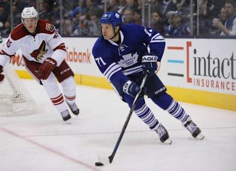 Jan 29, 2015; Toronto, Ontario, CAN; Toronto Maple Leafs forward David Clarkson (71) carries the puck past Arizona Coyotes defenseman Andrew Campbell (45) at the Air Canada Centre. Arizona defeated Toronto 3-1. Mandatory Credit: John E. Sokolowski-USA TODAY Sports