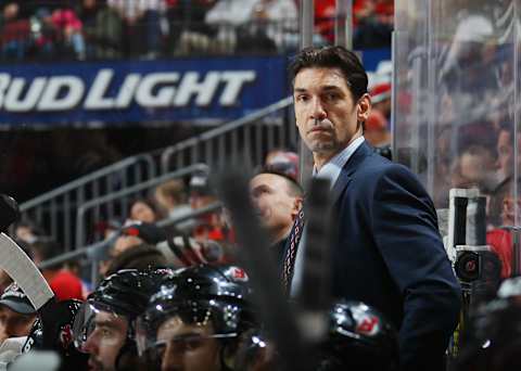 NEWARK, NJ – DECEMBER 11: Assistant coach Alain Nasreddine of the New Jersey Devils works the bench against the Detroit Red Wings at the Prudential Center on December 11, 2015 in Newark, New Jersey. The Devils defeated the Red Wings 3-2 in overtime. (Photo by Bruce Bennett/Getty Images)