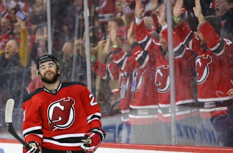 NHL Power Rankings: New Jersey Devils right wing Kyle Palmieri (21) celebrates his goal during the second period of their game against the Vancouver Canucks at Prudential Center. Mandatory Credit: Ed Mulholland-USA TODAY Sports