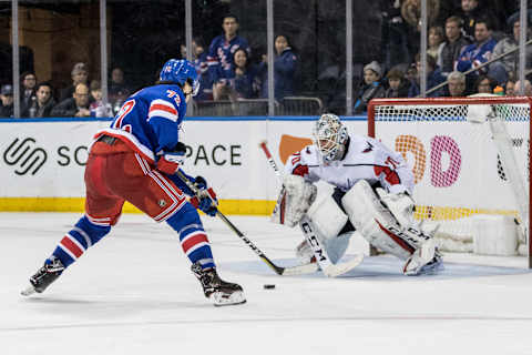 NEW YORK, NY – MARCH 03: New York Rangers Winger Filip Chytil (72) takes the puck towards a waiting Washington Capitals Goalie Braden Holtby (70) during a regular season NHL game between the Washington Capitals and the New York Rangers on March 03, 2019, at Madison Square Garden in New York, NY. (Photo by David Hahn/Icon Sportswire via Getty Images)