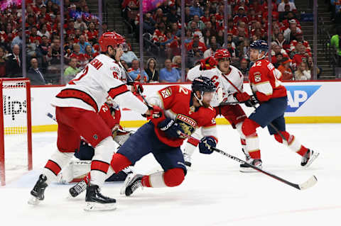 SUNRISE, FLORIDA – MAY 24: Jesperi Kotkaniemi #82 of the Carolina Hurricanes checks Eric Staal #12 of the Florida Panthers in Game Four of the Eastern Conference Finals of the 2023 Stanley Cup Playoffs at FLA Live Arena on May 24, 2023 in Sunrise, Florida. The Panthers defeated the Hurricanes 4-3 to take the series 4-0. (Photo by Bruce Bennett/Getty Images)