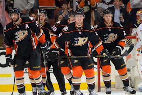 Mar 30, 2016; Anaheim, CA, USA; Anaheim Ducks center Ryan Kesler (17), defenseman Hampus Lindholm (47), left wing Jakob Silfverberg (33), defenseman Cam Fowler (4)and Aleft wing Jamie McGinn (88) head back to the bench after a goal in the third period of the game against the Calgary Flames at Honda Center. Ducks won 8-3. Mandatory Credit: Jayne Kamin-Oncea-USA TODAY Sports