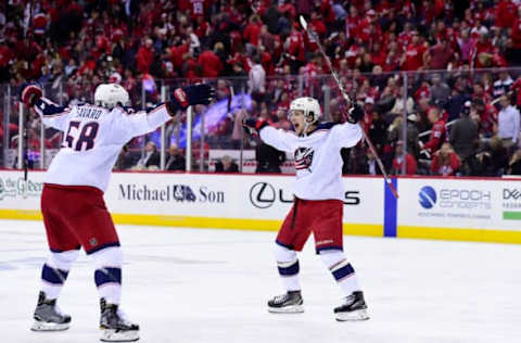 WASHINGTON, DC – APRIL 12: Artemi Panarin #9 of the Columbus Blue Jackets celebrates with David Savard #58 after scoring the game-winning goal in overtime against the Washington Capitals in Game One of the Eastern Conference First Round during the 2018 NHL Stanley Cup Playoffs at Capital One Arena on April 12, 2018 in Washington, DC. (Photo by Patrick McDermott/NHLI via Getty Images)