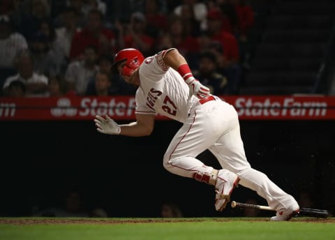 ANAHEIM, CA – SEPTEMBER 28: Mike Trout #27 of the Los Angeles Angels of Anaheim singles to left field during the fifth inning of the MLB game against the Oakland Athletics at Angel Stadium on September 28, 2018 in Anaheim, California. The Angels defeated the Athletics 8-5. (Photo by Victor Decolongon/Getty Images)