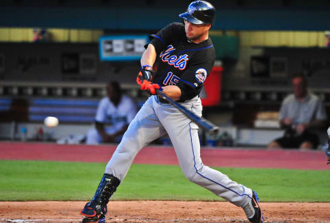 MIAMI GARDENS, FL – JULY 23: Carlos Beltran #15 of the New York Mets bats during a MLB game against the Florida Marlins at Sun Life Stadium on July 23, 2011 in Miami Gardens, Florida. (Photo by Ronald C. Modra/Sports Imagery/Getty Images)