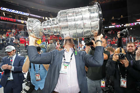 LAS VEGAS, NV – JUNE 07: Goaltender coach Olaf Kolzig of the Washington Capitals hoists the Stanley Cup after his team defeated the Vegas Golden Knights 4-3 in Game Five of the 2018 NHL Stanley Cup Final at T-Mobile Arena on June 7, 2018 in Las Vegas, Nevada. (Photo by Bruce Bennett/Getty Images)