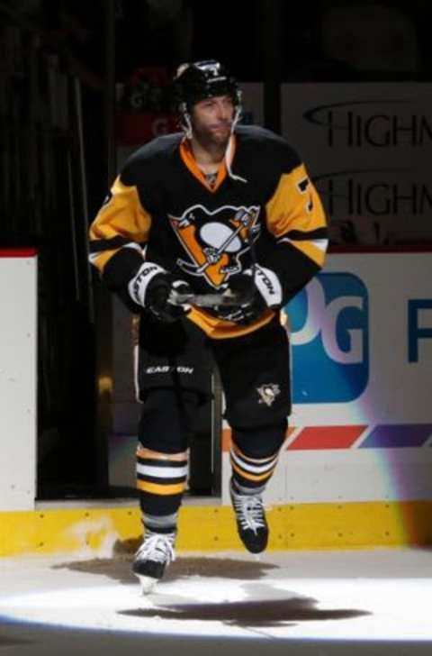 Jan 2, 2016; Pittsburgh, PA, USA; Pittsburgh Penguins center Matt Cullen (7) steps on to the ice after being named a star of the game against the New York Islanders at the CONSOL Energy Center. The Penguins won 5-2. Mandatory Credit: Charles LeClaire-USA TODAY Sports